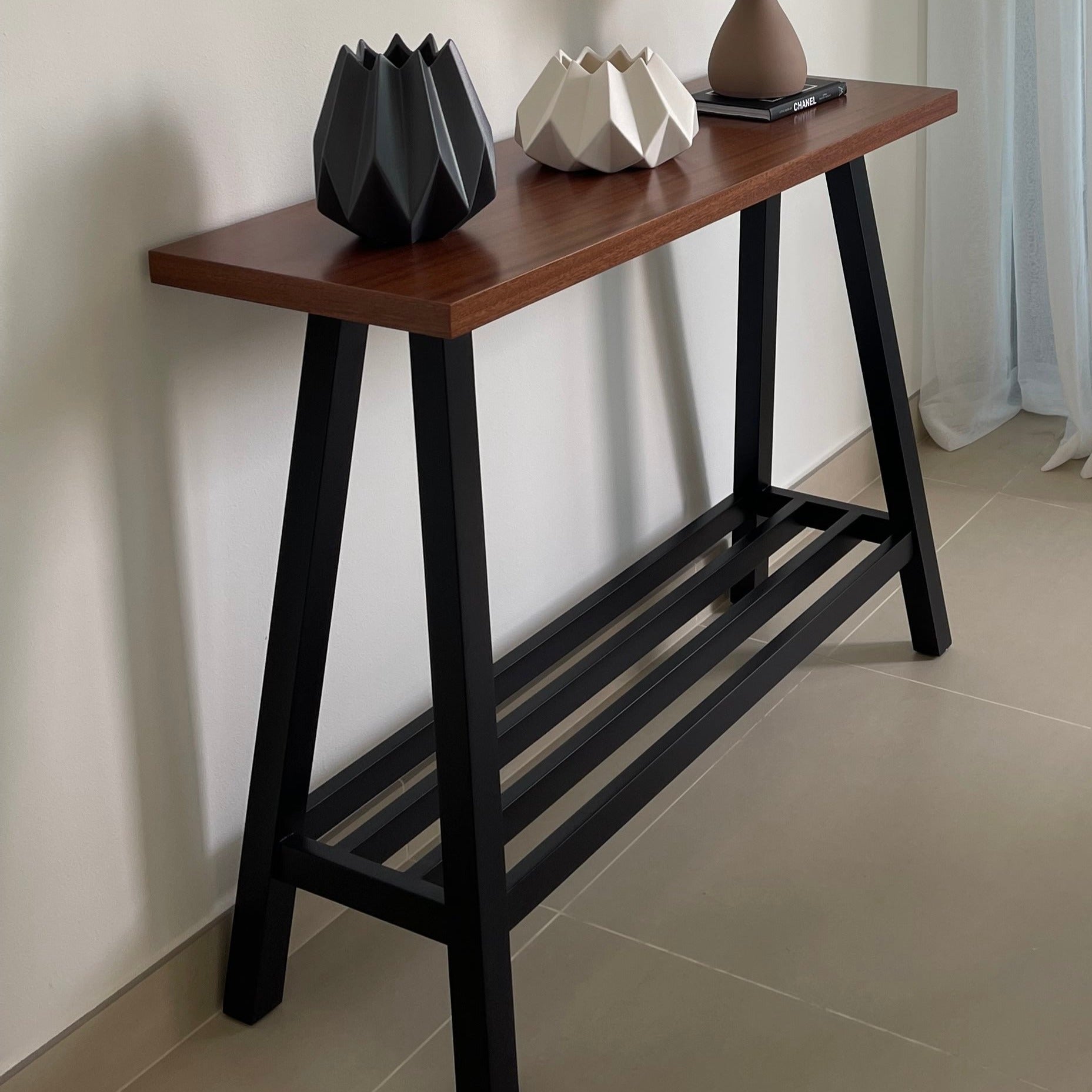 Black and store oak console table